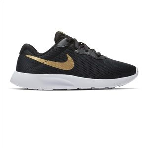 Black and gold nike shoes kids Clearance